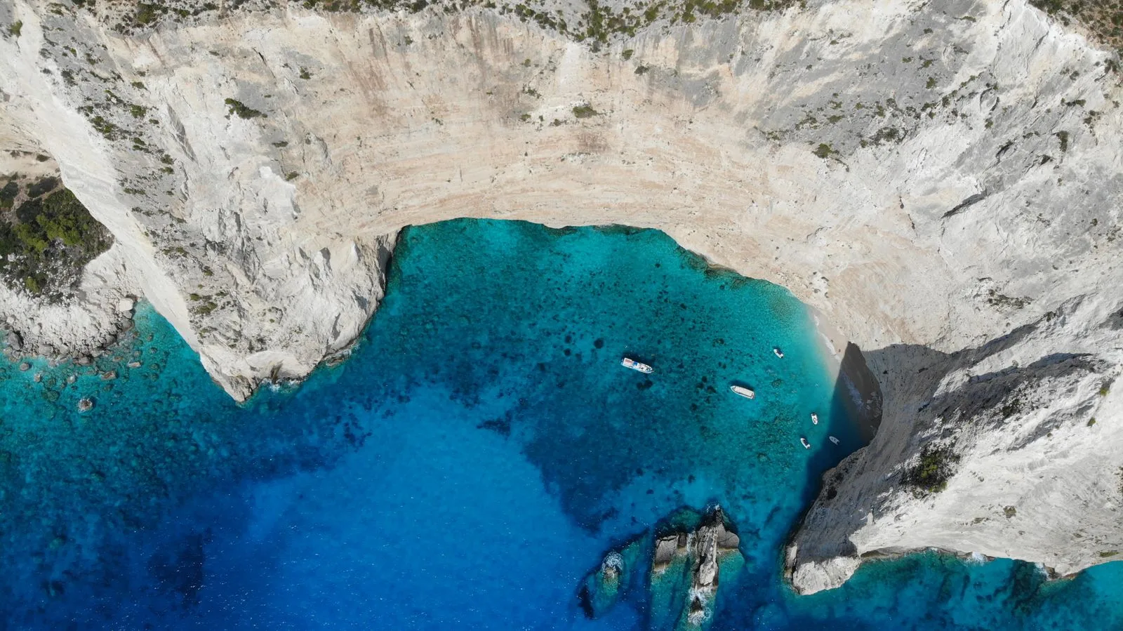 Aerial view of turquoise waters and coastline near Marathonisi, Zakynthos, Greece
