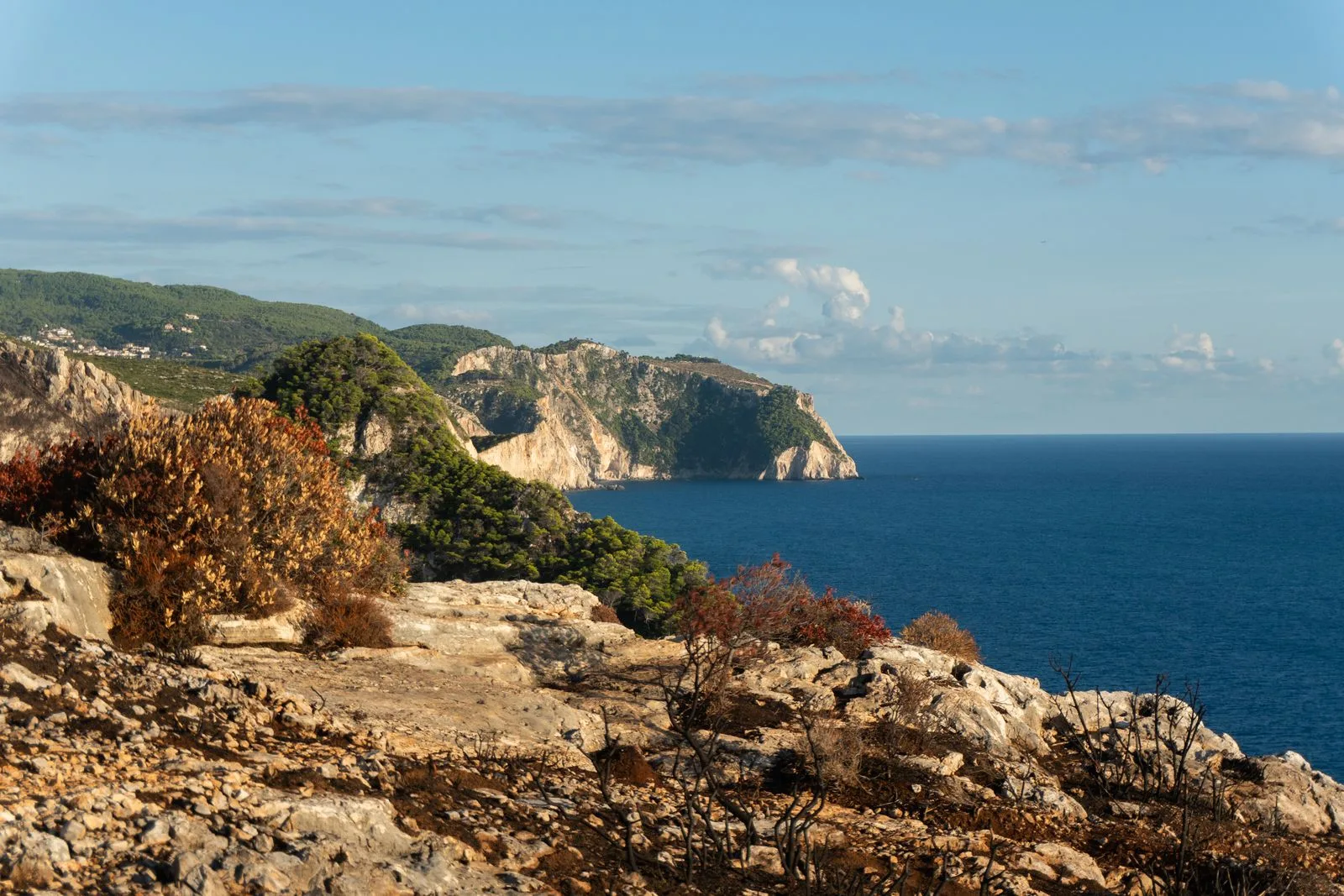 Rocky coastline and blue sea along the northern coast of Zakynthos, Greece